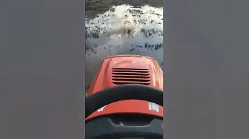 Straight piped husqvarna cth 150 xp going through mud and water